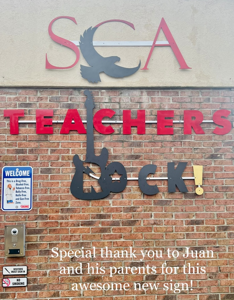 SCA Teachers Rock Sign by Mr. and Mrs. Espinoza Inga. 